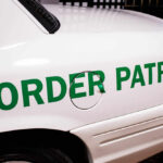 Close-up of a border patrol vehicle with green lettering