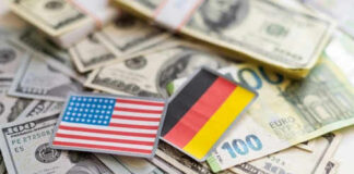 USA and Germany flags on various currencies