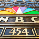 NBC logo with colorful peacock design.