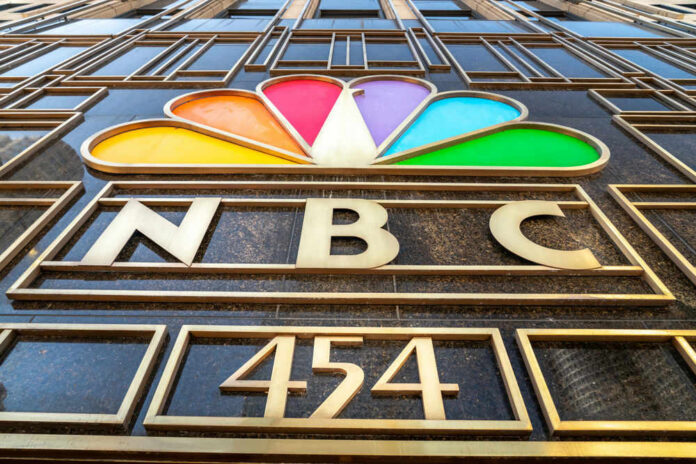 NBC logo with colorful peacock design.