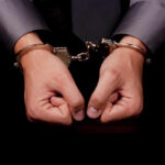 The Allegations Raise Serious Concerns Again Hands in handcuffs, symbolizing arrest or detention