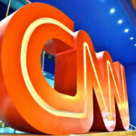 CNN logo sculpture outside building entrance