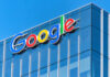 Google logo on glass office building facade