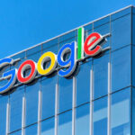 Google logo on glass office building facade