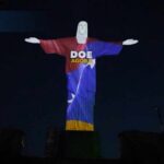 Christ the Redeemer in Rio de Janeiro lights up in tribute to the victims of the earthquakes in V...