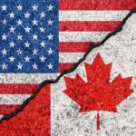 USA and Canada flags with a cracked border