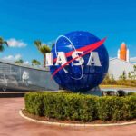 NASA globe sign at visitor complex entrance