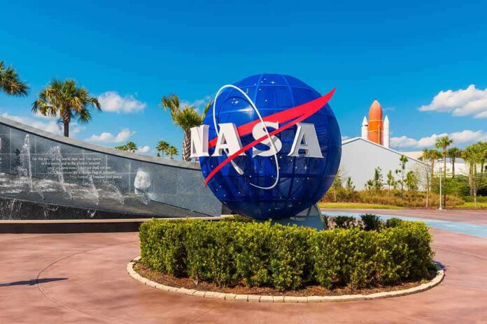 NASA globe sign at visitor complex entrance
