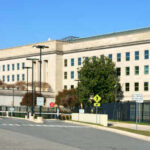 Exterior view of the Pentagon building with clear blue sky