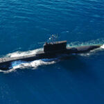 Submarine sailing on the ocean surface
