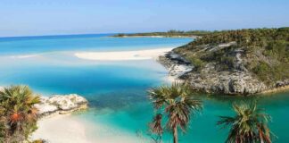 Tropical lagoon with turquoise water and white sand beach