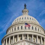 United States Capitol dome with American flag