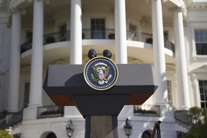 Presidential podium with seal in front of white-columned building