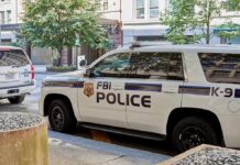 FBI police K-9 SUV parked on a city street