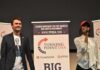 Curro Savoy at a TPUSA event with another speaker on stage
