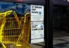 Stolen Benefits – Now a ‘Qualification’? Yellow shopping carts beside store entrance with SNAP benefits sign