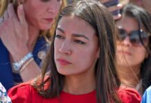 woman in red top at an outdoor event