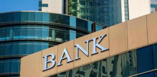 bank building exterior with glass and signage