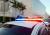 Runaway Teens Turn Suburb Into Crime Scene Police car roof with flashing red and blue lights
